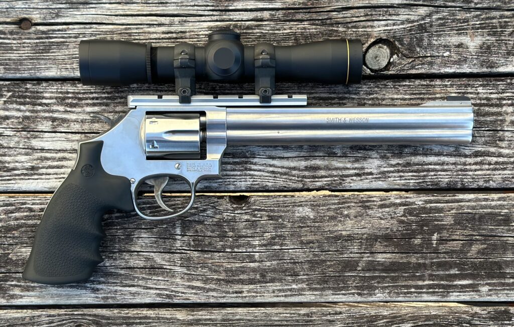 Smith & Wesson Model 647 17 HMR Stainless 8″ Barrel W/ Leupold M8-4X Scope