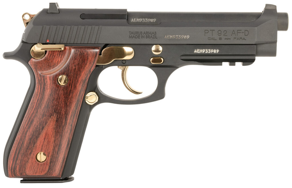 Taurus 1-920151GLD-HW1 92  Full Size Frame 9mm 17+1 5″ Matte Black Stainless Steel Barrel, Matte Black Serrated Alloy Steel Slide, Matte Black w/Gold Accents Aluminum Frame w/Picatinny Rail, Wood Grip