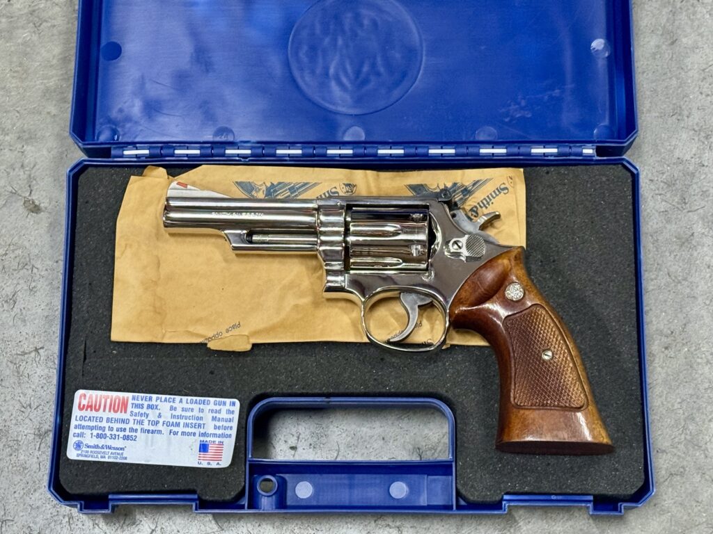Smith & Wesson Model 19-4 .357 Magnum – 4″ Nickel K-Frame, Red Ramp / White Outline Sights (Used) – 50K9054