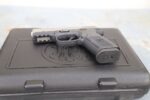 FN FNS-40 .40 S&W Pistol – Two-Tone Black/Silver, 14-Round Capacity, Night Sights (Used) – GKU0074253 - View 3