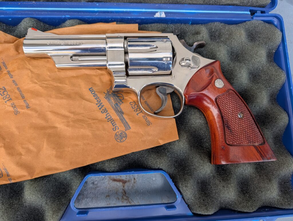 Smith & Wesson Model 29-2 – .44 Magnum, 8 3/8″ Barrel, Blue Finish, Wood Case & Box (Used) – N786617